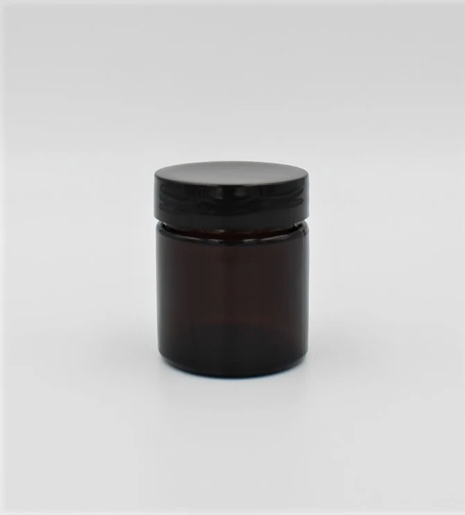 Pot en verre ambré avec couvercle noir