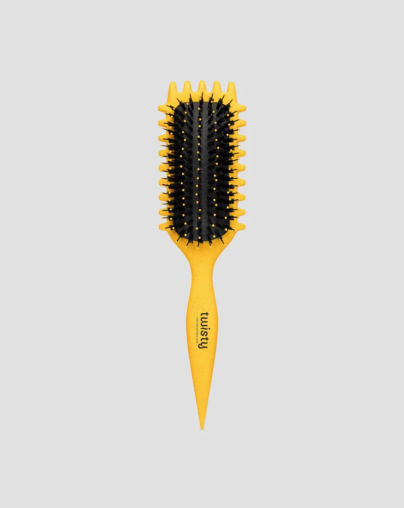 Brosse pour cheveux bouclés et ondulés pour définir les torsions