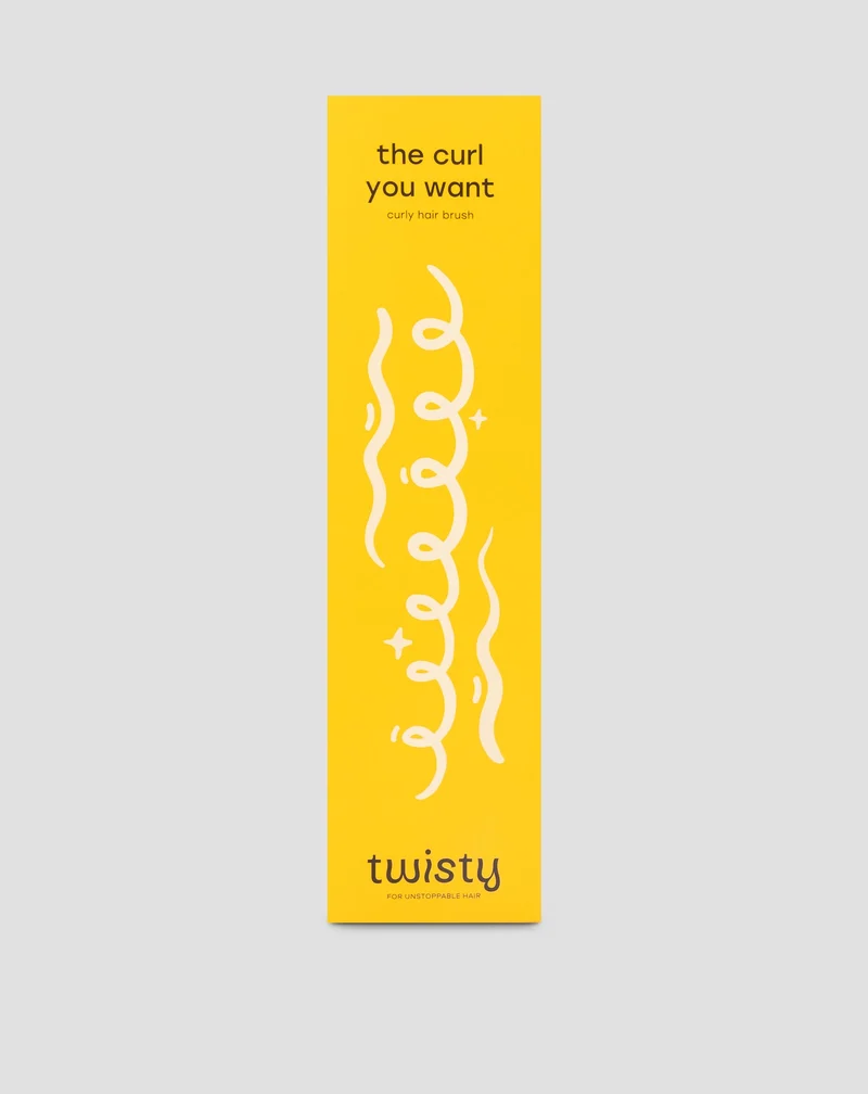 Brosse pour cheveux bouclés et ondulés pour définir les torsions