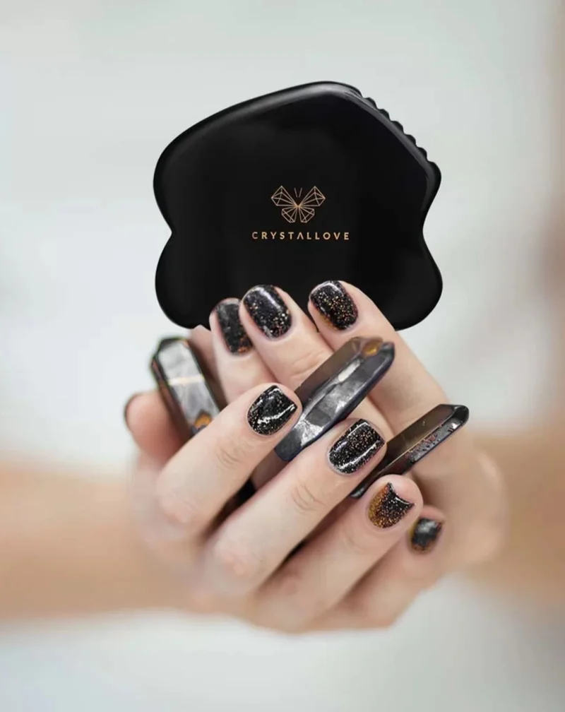 Plaque de massage du visage gua sha en obsidienne, pierre d'une grande puissance Crystallove
