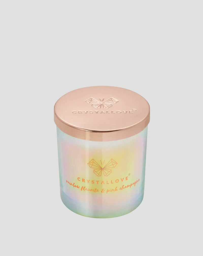 Bougie de soja avec fluorine arc-en-ciel et champagne rose dans un récipient en verre Crystallove