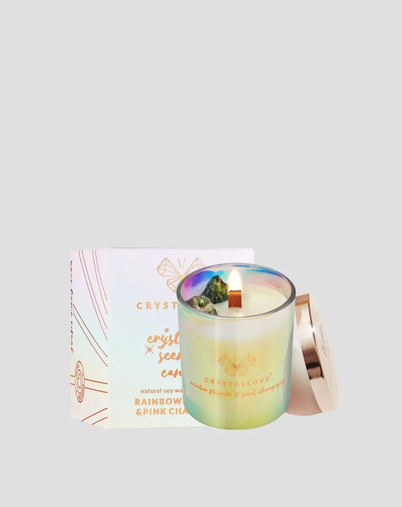 Bougie de soja avec fluorine arc-en-ciel et champagne rose dans un récipient en verre Crystallove
