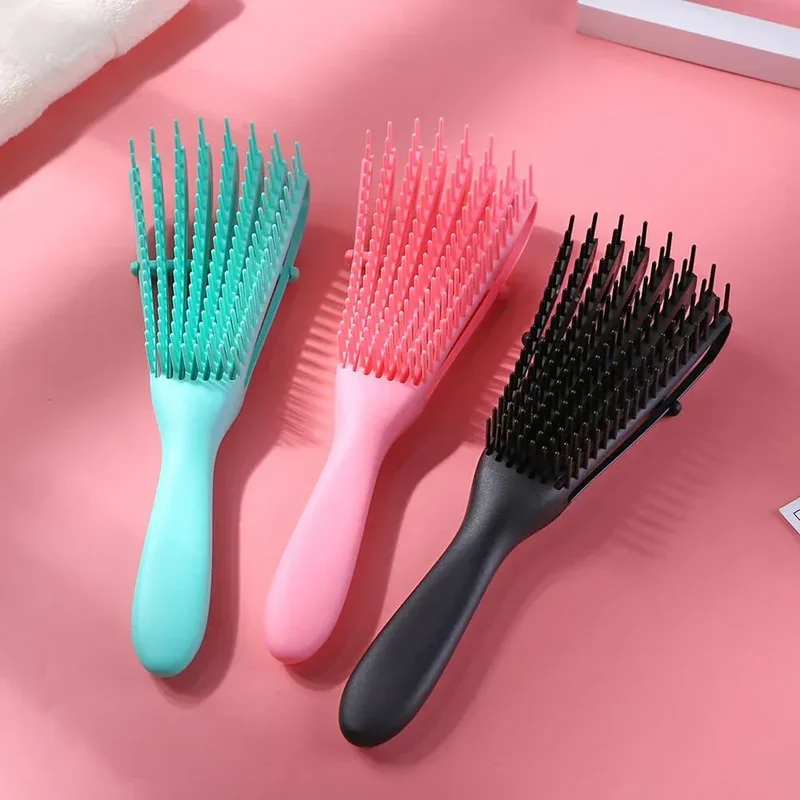 Ethni Beauty Market - Brosse démêlante et massante (Plusieurs couleurs disponibles)